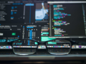 Glasses in front of a computer screen